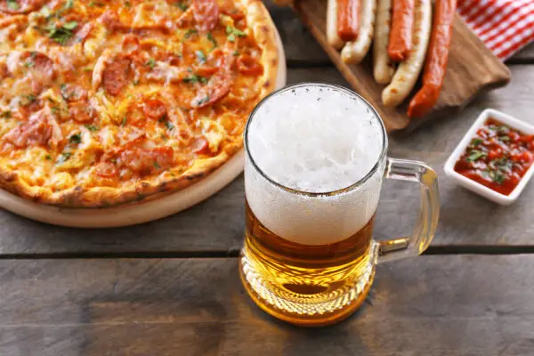Should You Drink Beer Before or After Eating?