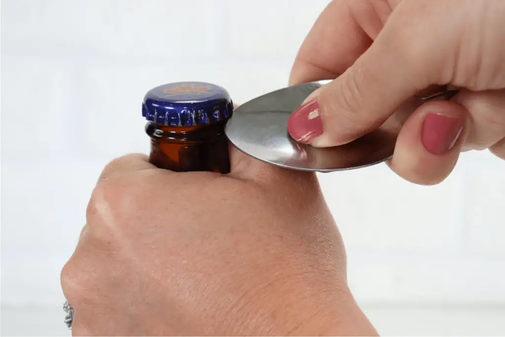 How To Open a Bottle Cap With a Spoon [StepbyStep]